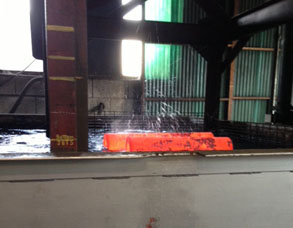 Heat treated part being quenched Heat treated part being quenched